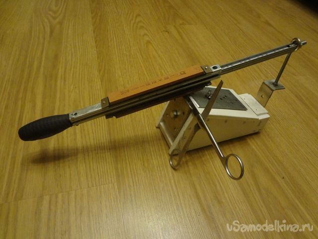 Приспособление для заточки ножей, ножниц и т.д